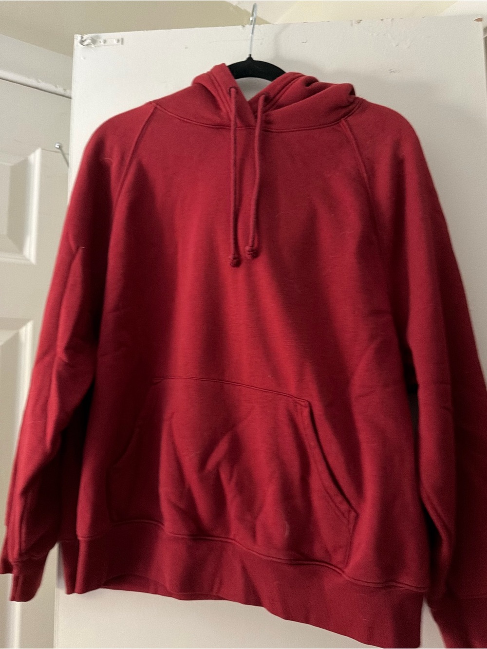 Woman’s Red Pullover Hoodie - Classic Comfort
